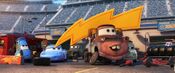 Mater, Sally, and Guido in McQueen's pit crew