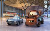 Promotional image of Finn and Mater at the airport.