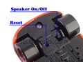 The on and off speaker and reset button