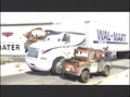 Wally Hauler talking to Mater in the Walmart Commercial