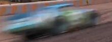 Blurred image of Ernie racing.