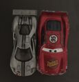 A Lightning McQueen diecast (1:55 scale) comparied to a Hot Wheels car (1:64 scale)